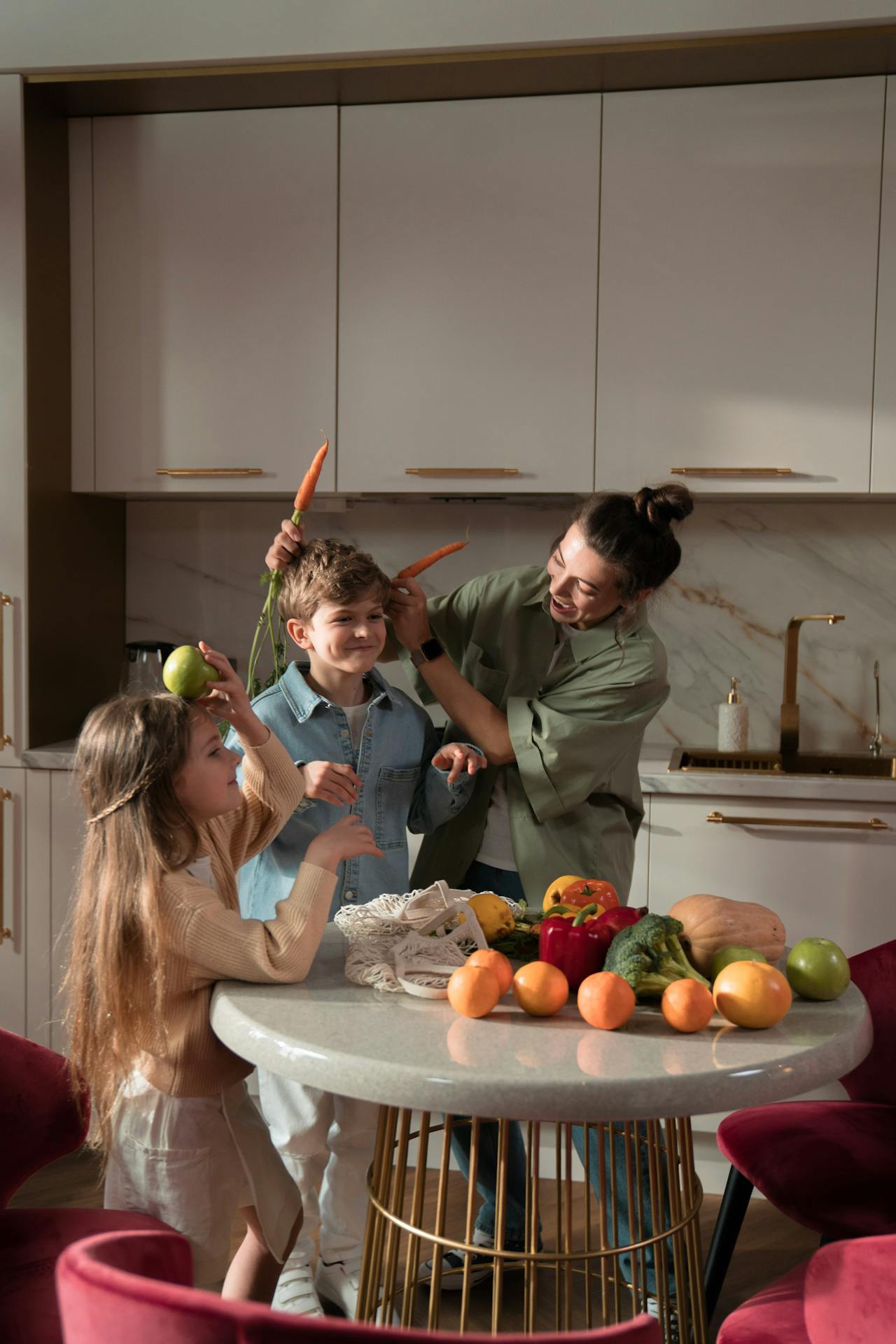Photo showing a mother and her kids in the kitchen